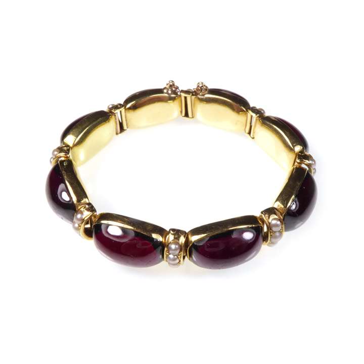 Antique cabochon garnet and half-pearl bracelet, with eight oblong cabochon garnets